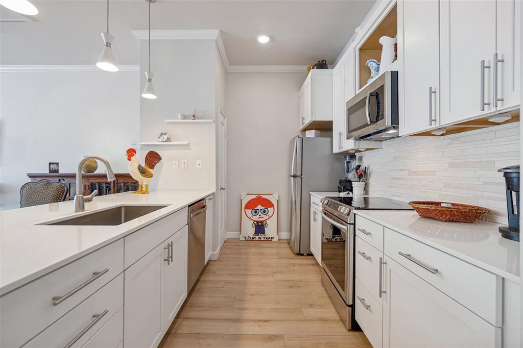 Replaced cabinets, pantry microwave & storage!