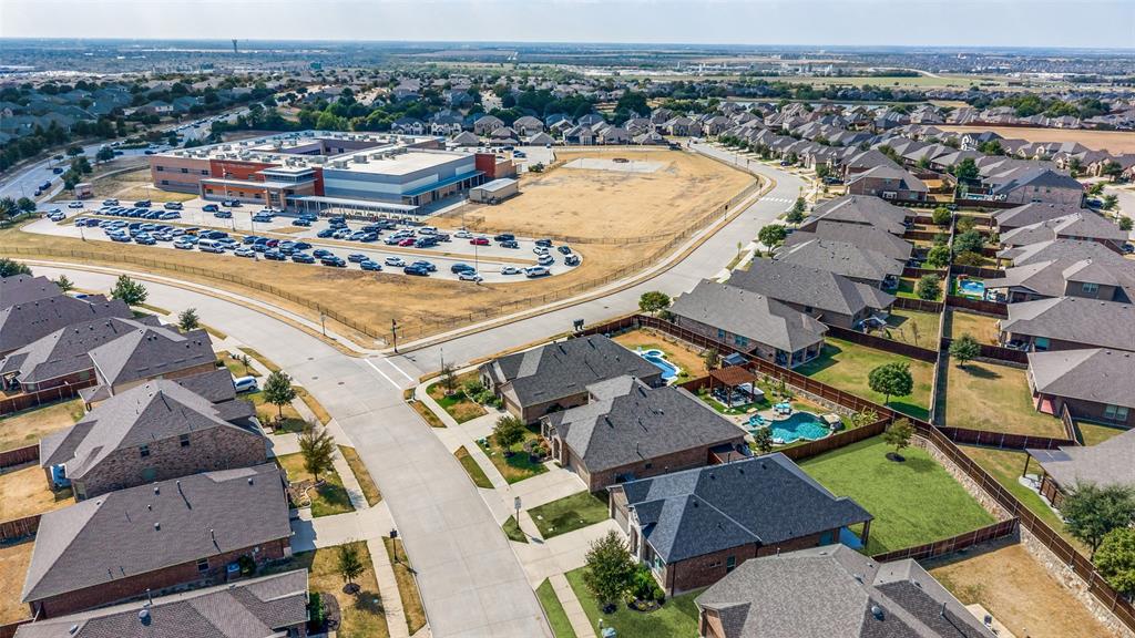 Residential community featuring a variety of single-family homes with fenced backyards