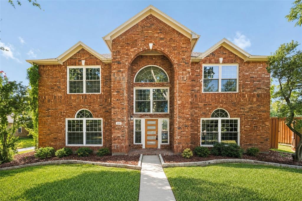 Brick façade with gabled roof lines Brick façade with gabled roof lines