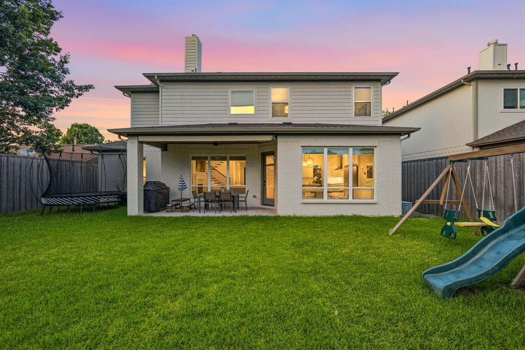 Backyard with large grassy area