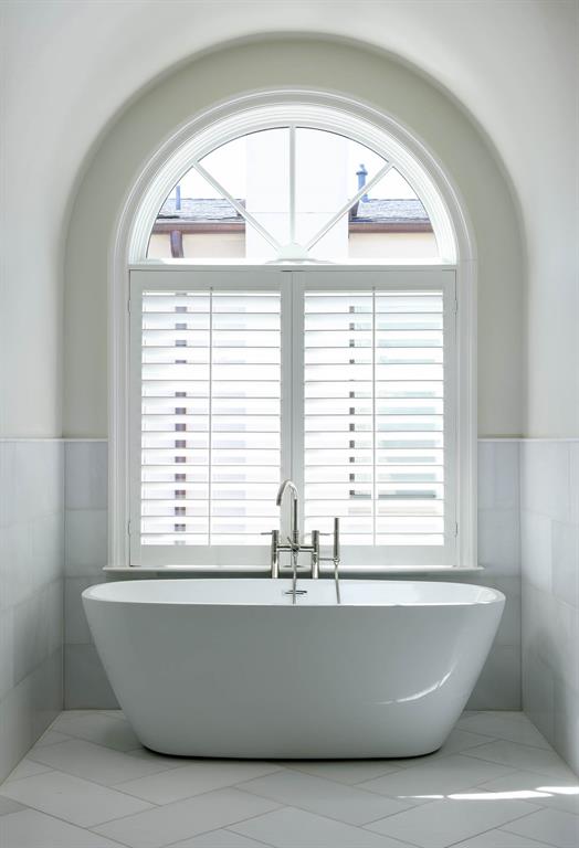 Primary bathroom with stand alone tub