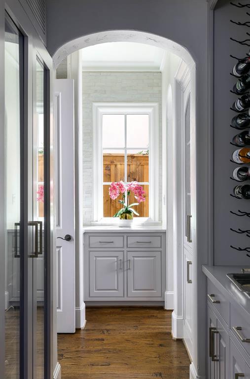 Butler's pantry with temperature controlled wine refrigeration and storage