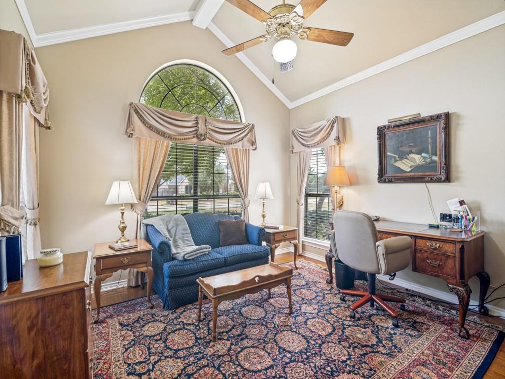 Currently used as an office, this room has a vaulted ceiling and closet.