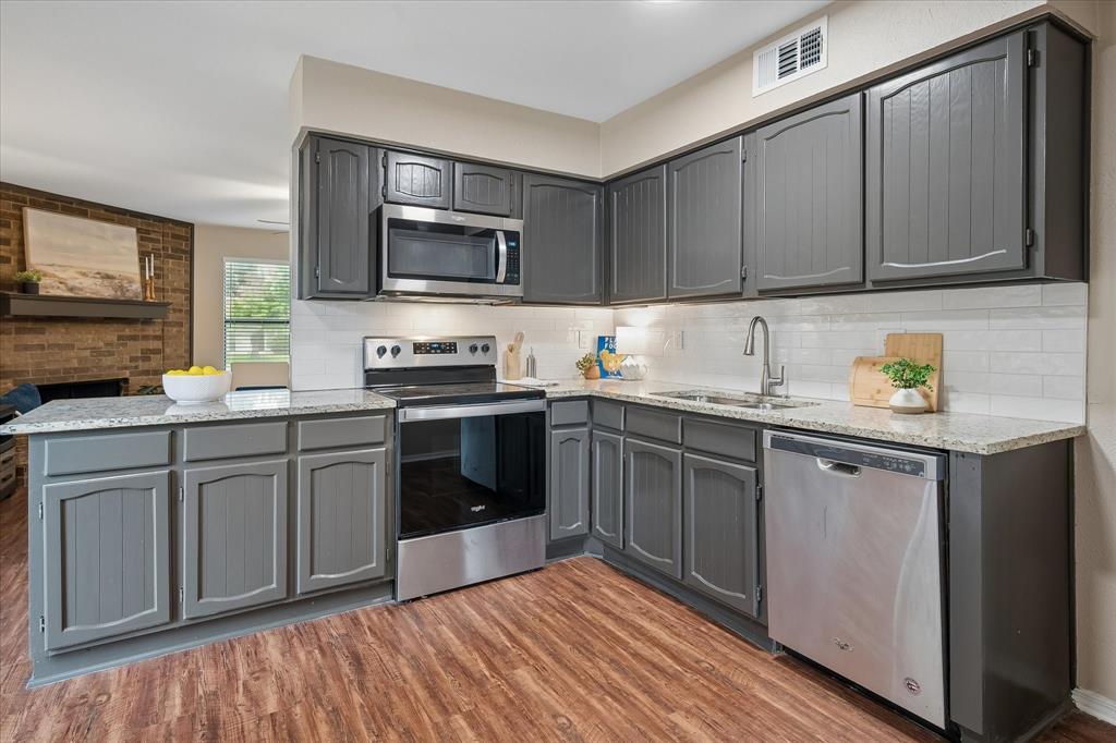 Updated countertops and  paint on the cabinets.