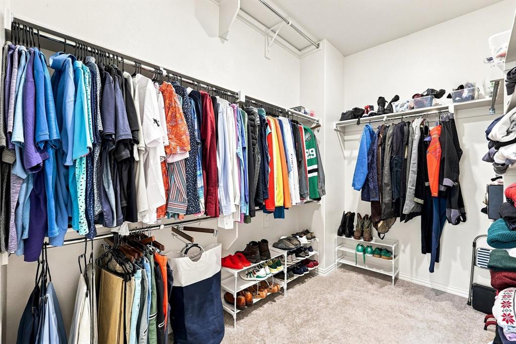 Closet space that delivers. A generously sized walk-in closet offers abundant hanging space, shelving, and room to keep everything organized without compromise.
