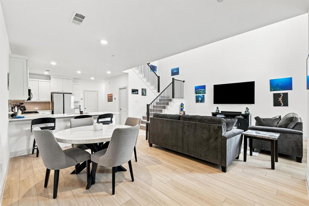 This is the floor plan buyers are looking for. Kitchen, dining, and living spaces come together in one expansive, light-filled setting made for connection.