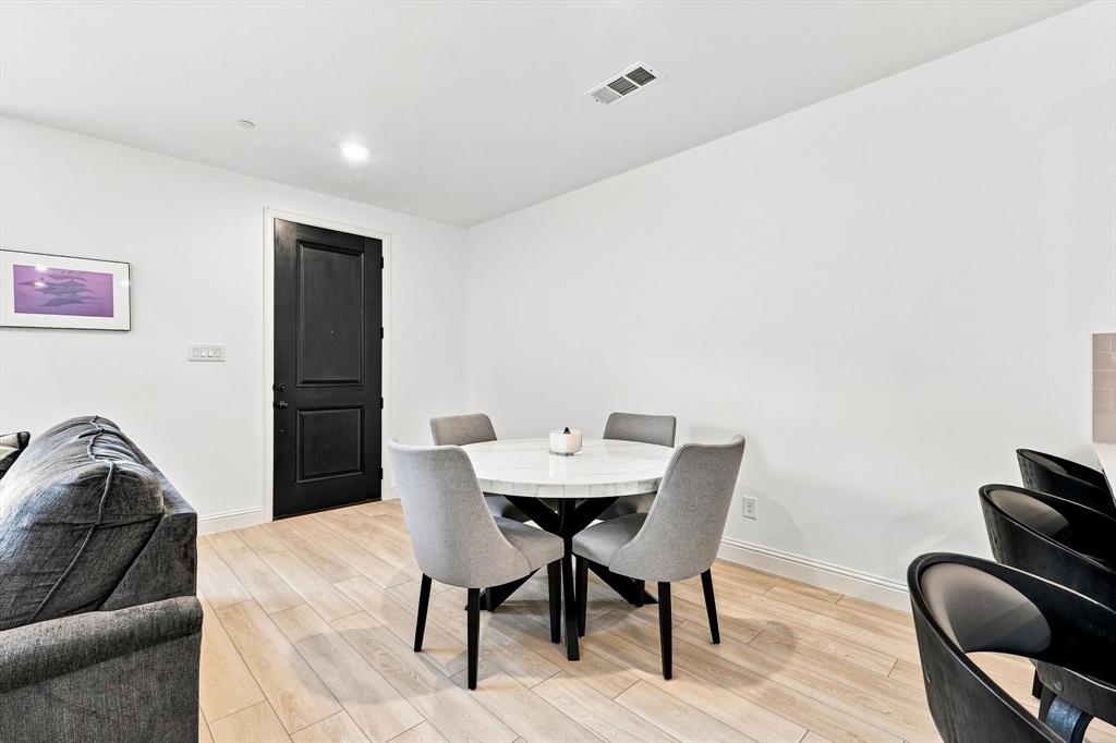 A dedicated dining space offers the perfect setting for morning coffee, intimate dinners, or gathering with friends—all just steps from the kitchen.
