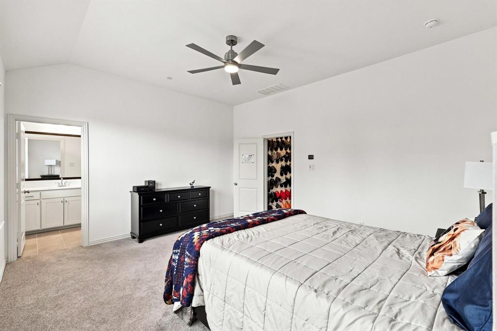 More than a bedroom—it’s a true suite. Generous proportions, a vaulted ceiling, and direct access to the private bath create an impressive owner’s retreat.