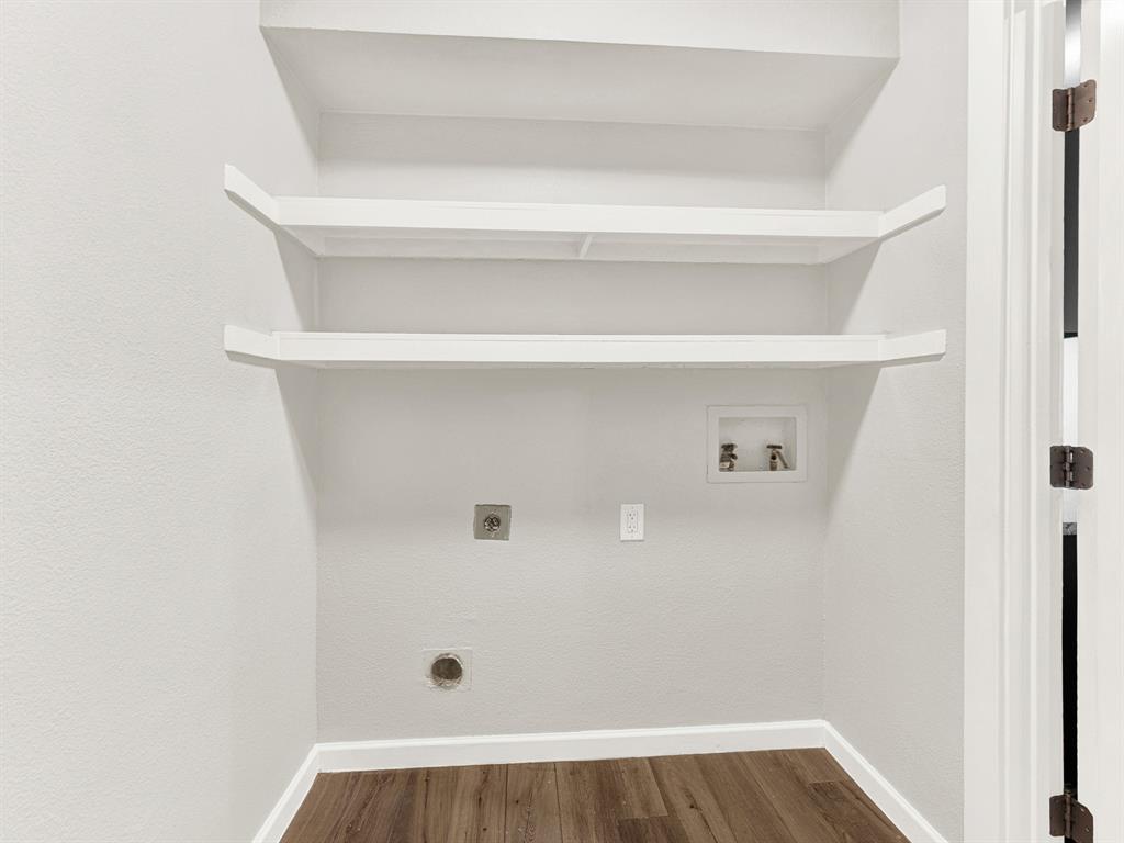 Laundry room with extra shelving for even more storage space