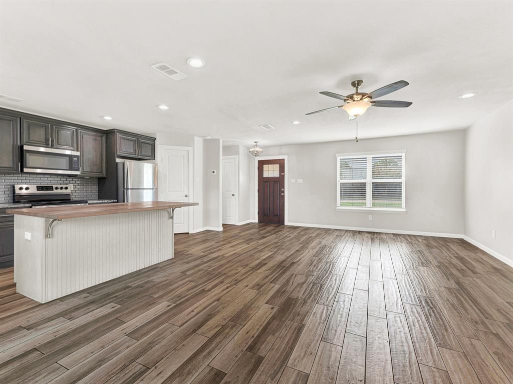 Open concept living at it's best- living room, kitchen, breakfast bar, and dining area Open concept living at it's best- living room, kitchen, breakfast bar, and dining area