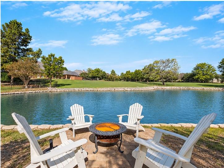 Beautifully designed outdoor living spaces overlooking the pool and pond.
