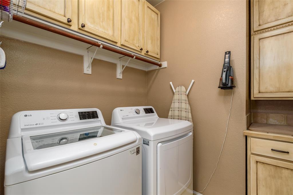 A utility room with plenty of storage.