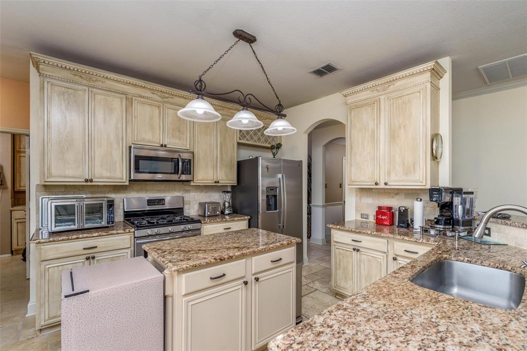 Your kitchen features stainless steel appliances and granite countertops.