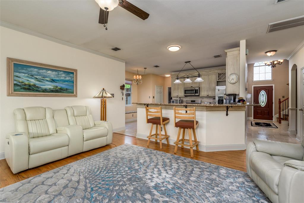Your living and kitchen area are open for a continuous flow from the front to back of the home.