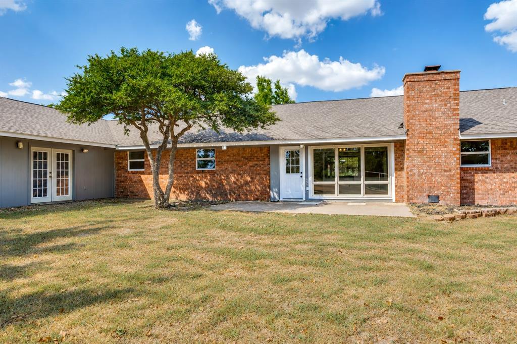 Brick exterior construction with a shingle roof
