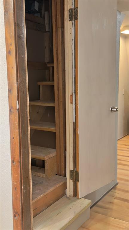 Stairs are located in the kitchen area