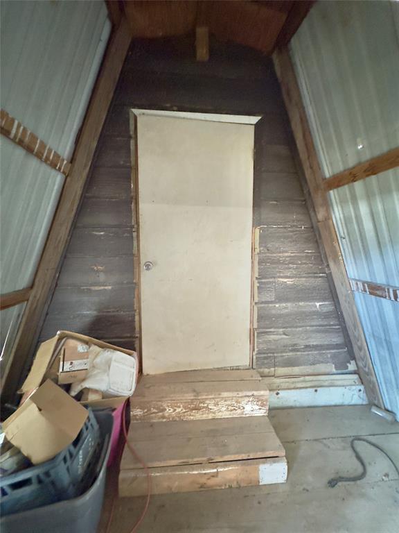 Upstairs Storage Room that goes out to the shop