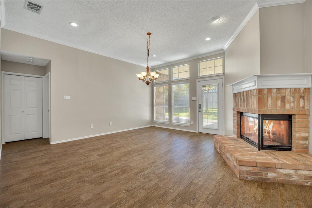 Family room with kitchen behind you - fireplace can be seen from both! Family room with kitchen behind you - fireplace can be seen from both!