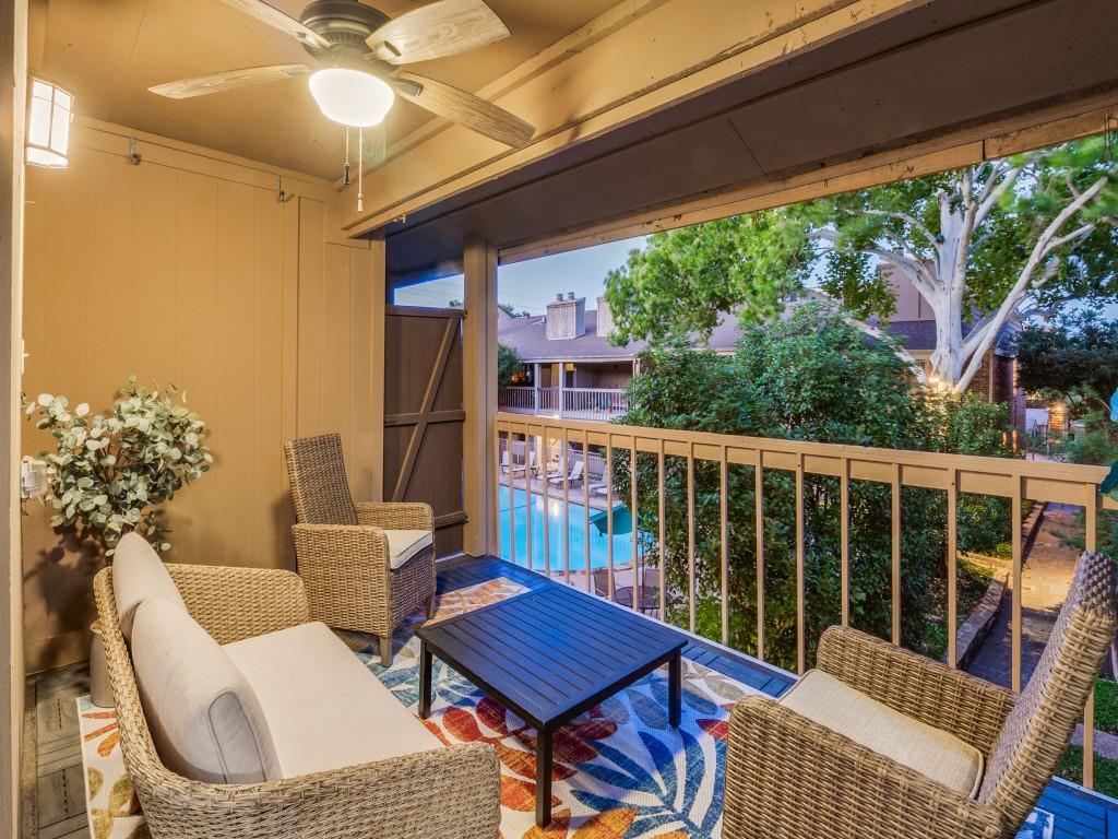 Spacious balcony overlooks pool