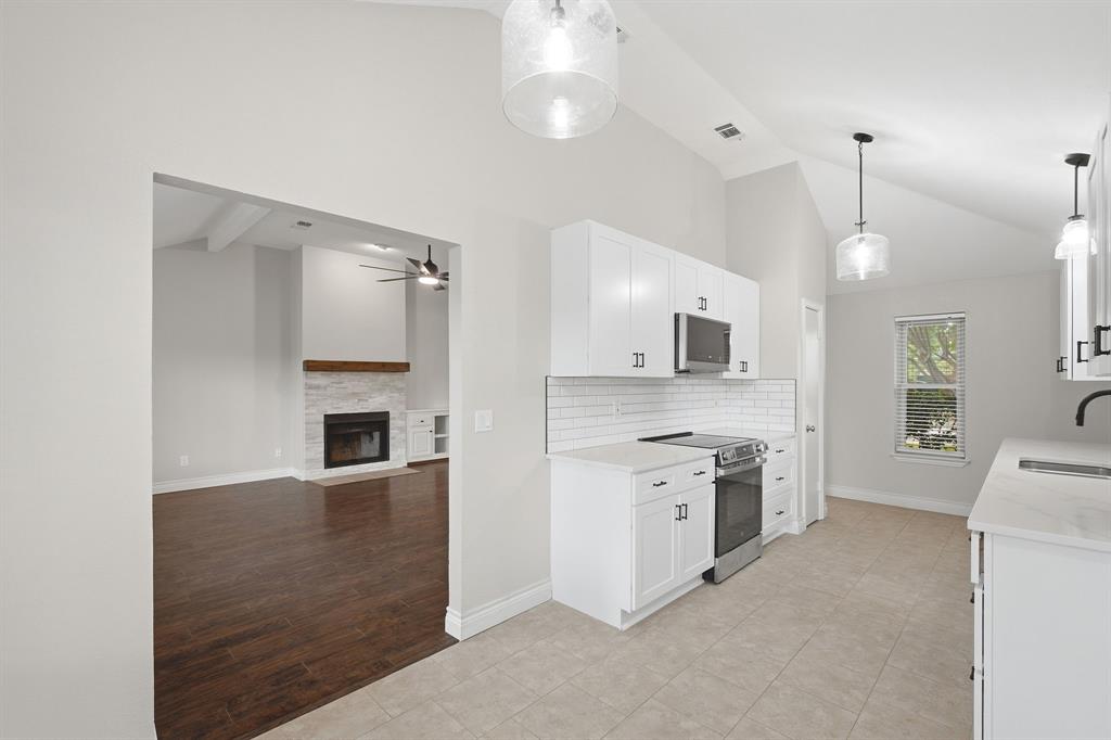 View from breakfast area toward Kitchen and Living Room.