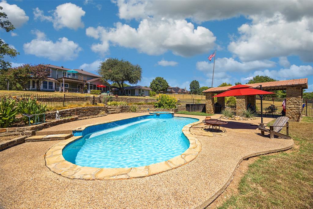 Cocktail pool with sitting area and cabana