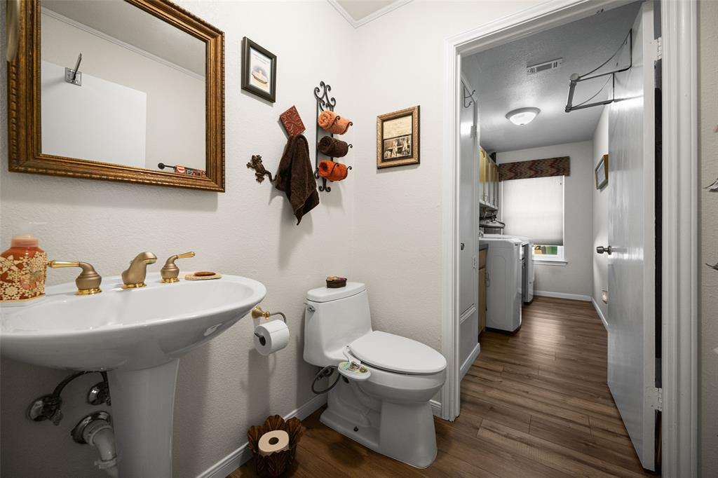 Laundry room with halfbath