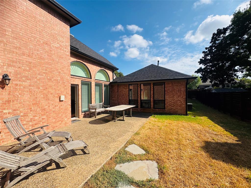 Brick exterior with arched transom windows