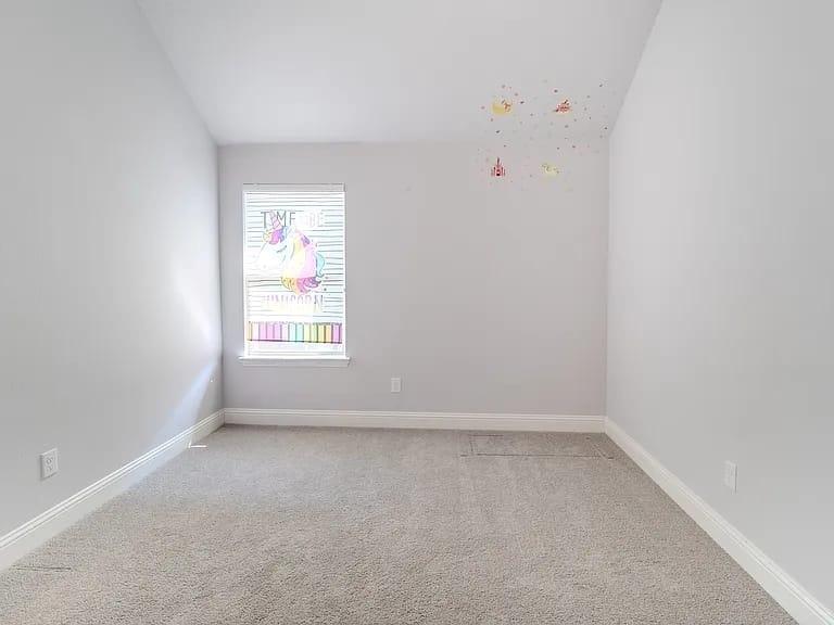 Neutral paint colors with wall-to-wall carpeting and white trim
