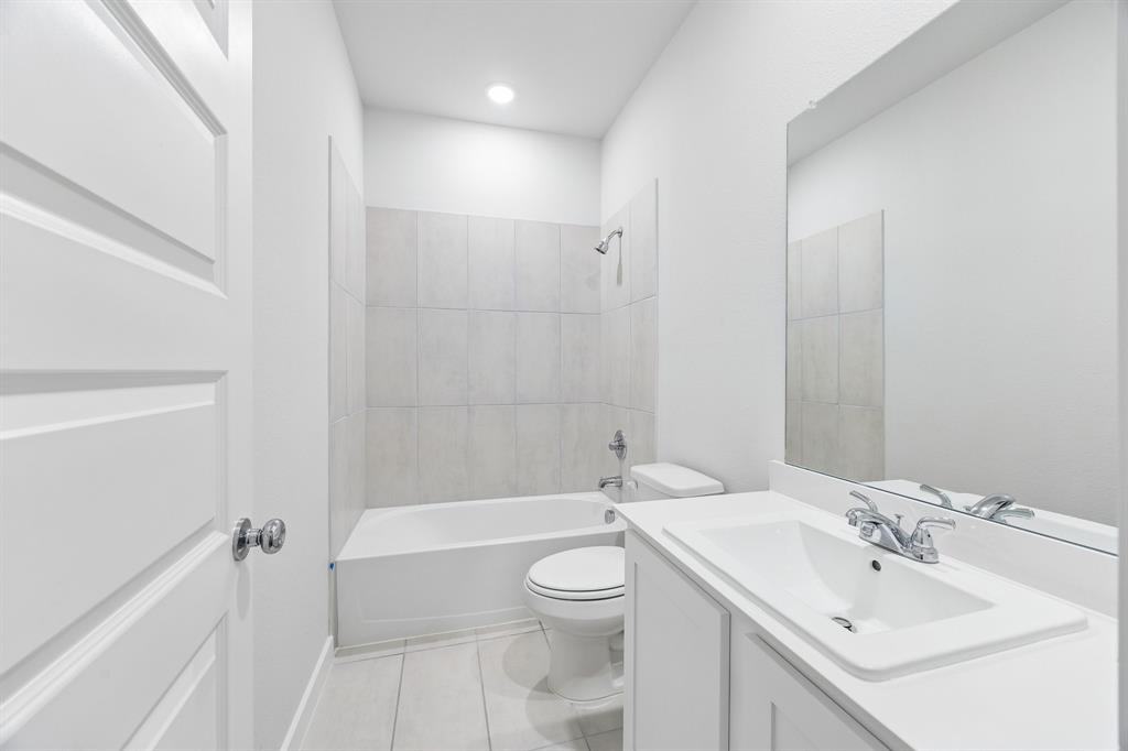 Bathroom in the Cedar home plan by Trophy Signature Homes – REPRESENTATIVE PHOTO
