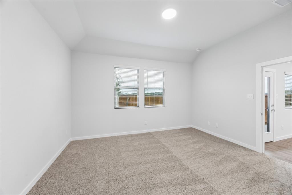 Primary Suite in the Cedar home plan by Trophy Signature Homes – REPRESENTATIVE PHOTO