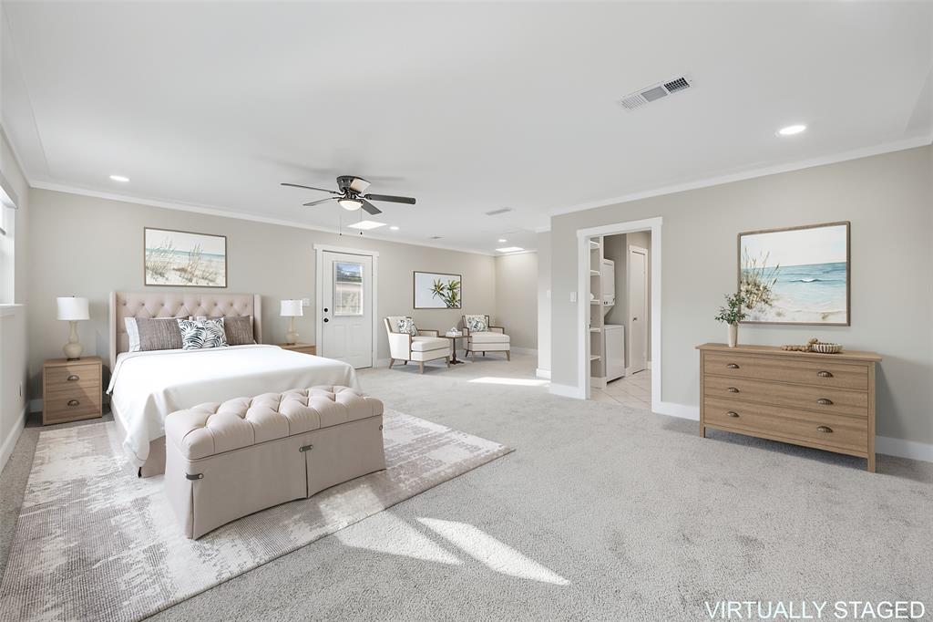 Spacious upstairs guest suite featuring neutral finishes, recessed lighting, generous closet space and a private bath and a separate entrance and dedicated laundry area.