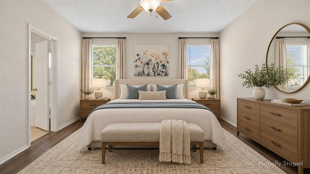 Space to Create a True Bedroom Retreat – Two windows bring natural light into the spacious primary suite, while a broad wall layout provides ample room for a substantial bed, additional furnishings, or a comfortable sitting area.