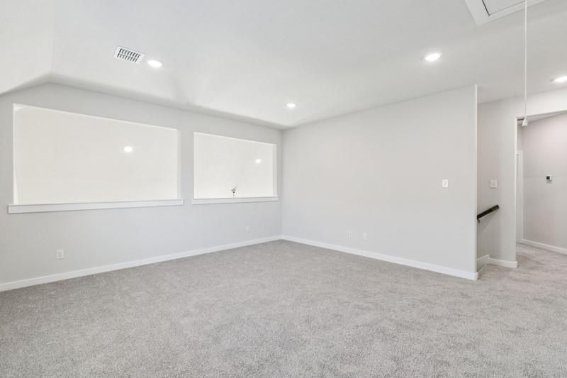 Game Room in the Winters home plan by Trophy Signature Homes – REPRESENTATIVE PHOTO
