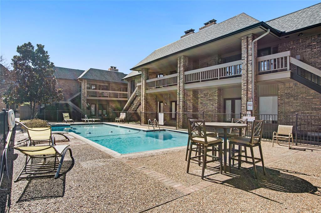 Community pool featuring a patio area