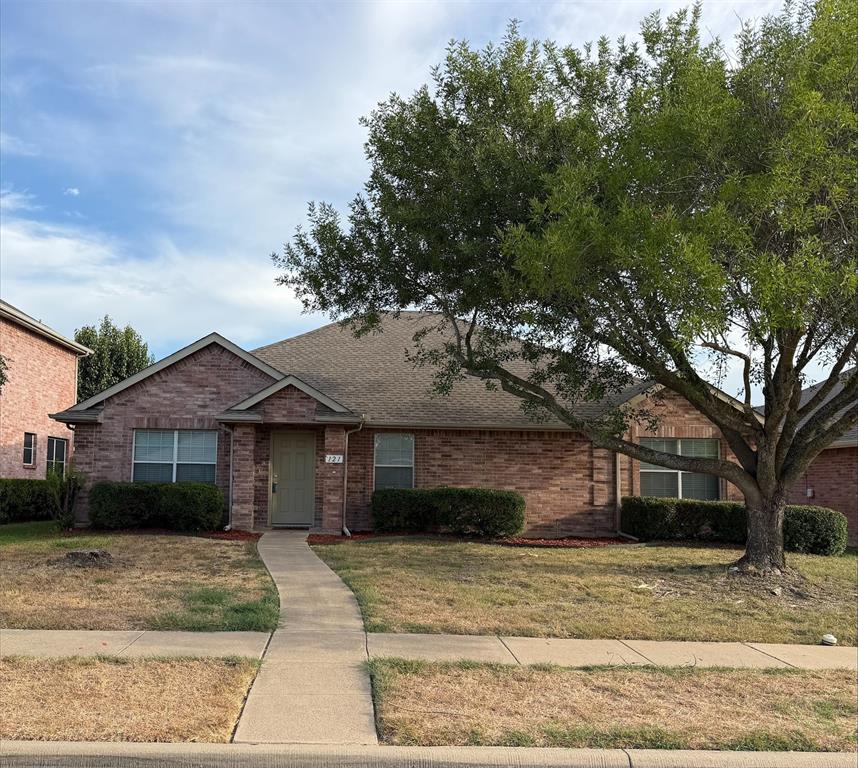Brick exterior with gabled roofline and covered entry Brick exterior with gabled roofline and covered entry
