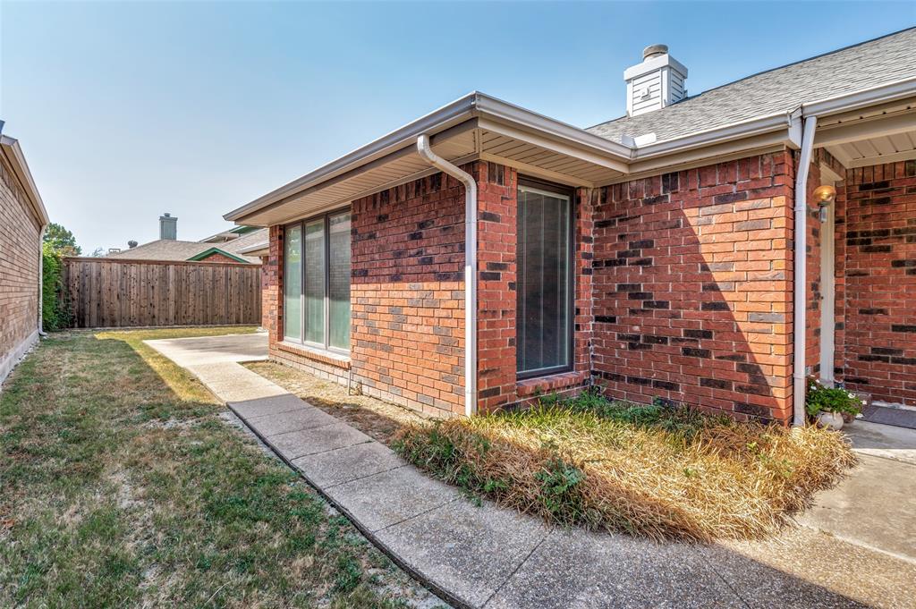 Red brick exterior with white trim