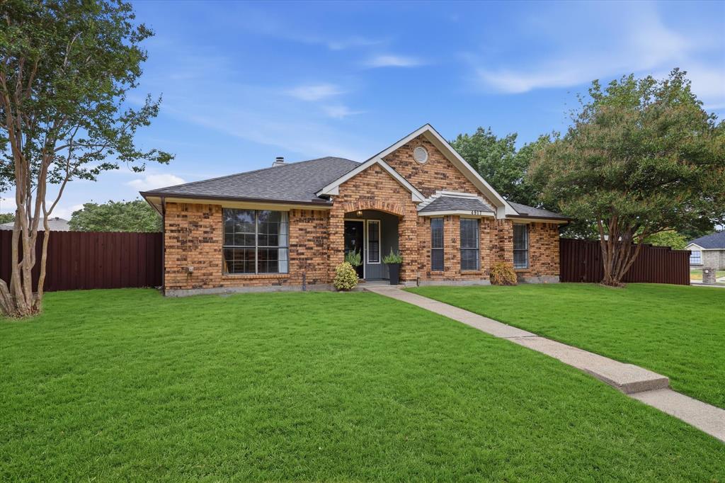 Expansive corner lot provides added yard space and enhances the home’s inviting curb appeal.