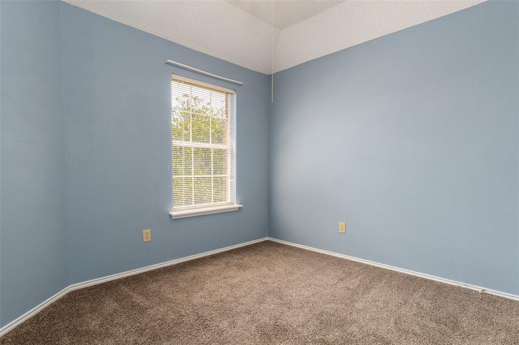 Soft blue painted walls with carpet flooring