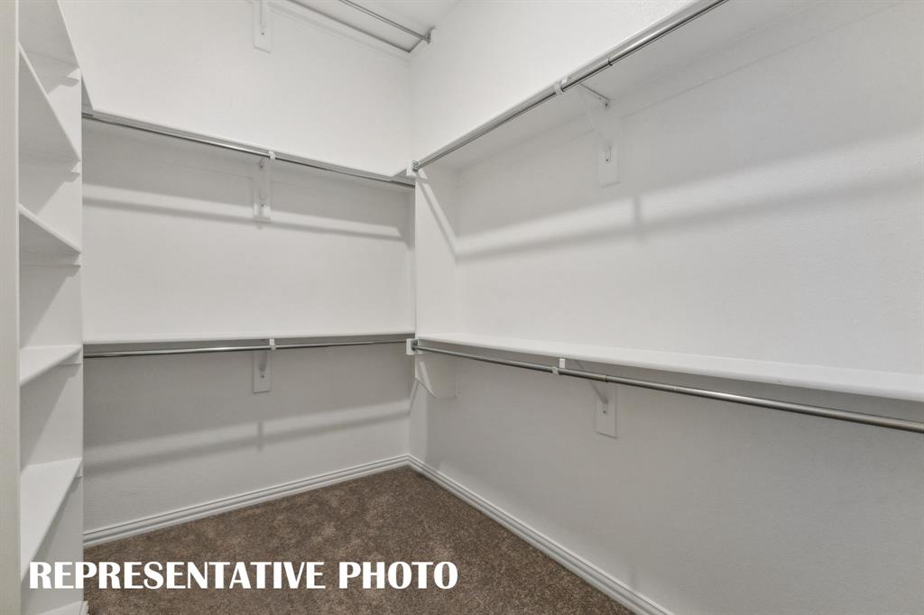 With space galore and seasonal hanging area, you're dream owner's closet awaits!  REPRESENTATIVE PHOTO