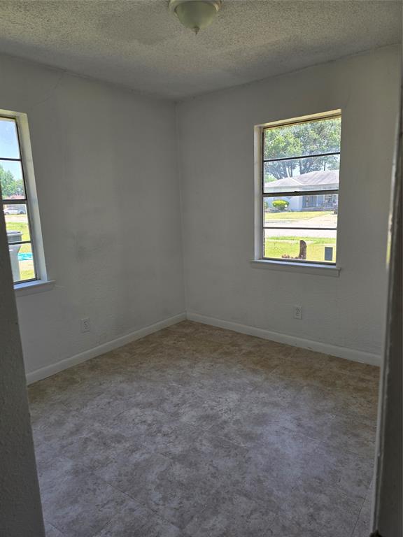 White wall finishes and neutral-toned flooring