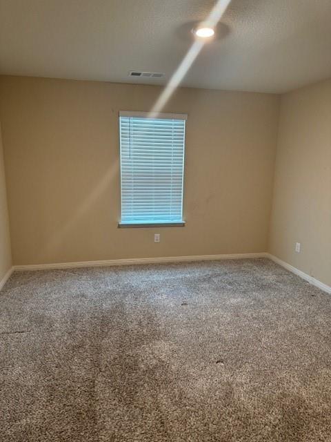 Recessed ceiling lighting, textured wall finish, window with horizontal blinds, and carpeted flooring Recessed ceiling lighting, textured wall finish, window with horizontal blinds, and carpeted flooring