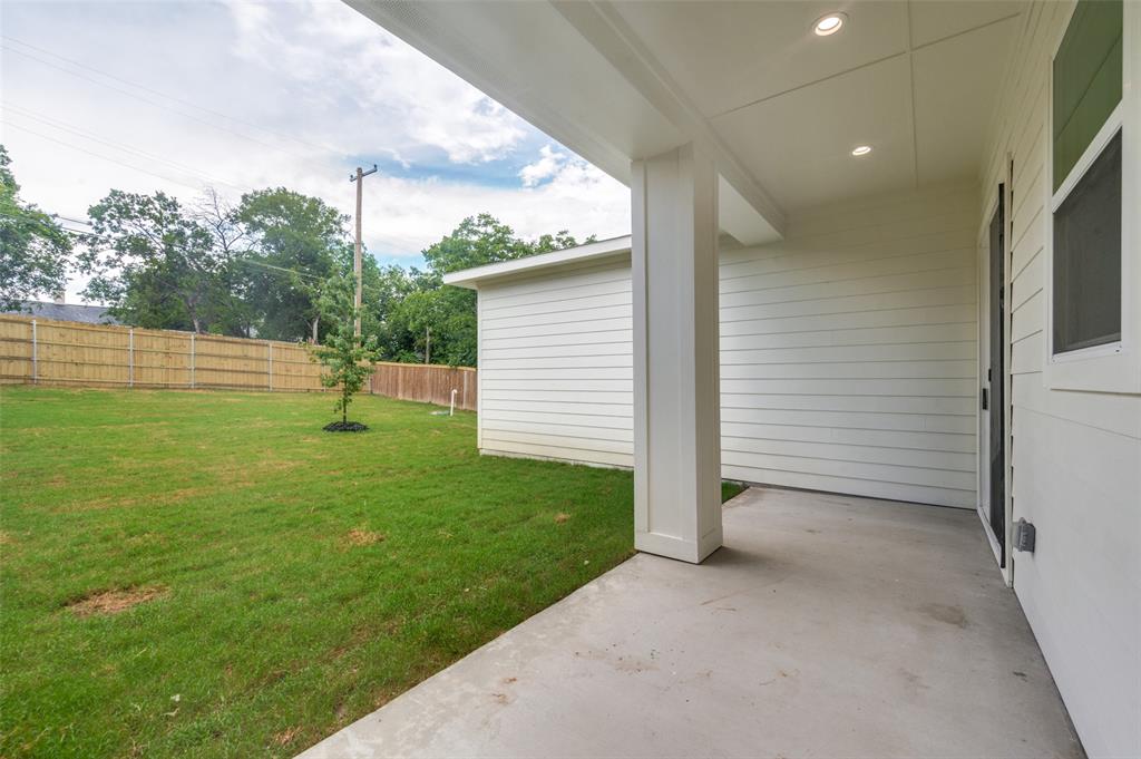 Covered concrete patio with recessed lighting