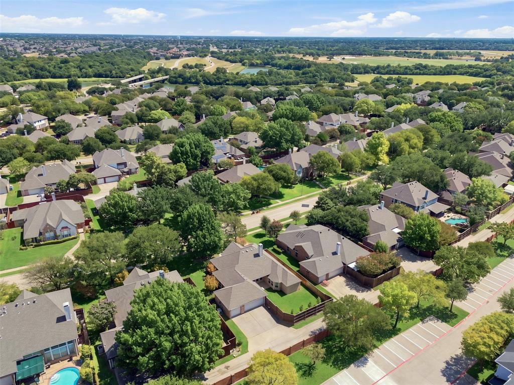 Residential Neighborhood with mature trees and landscaping.