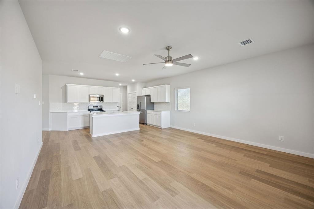 Living Room in the Oak II home plan by Trophy Signature Homes – REPRESENTATIVE PHOTO