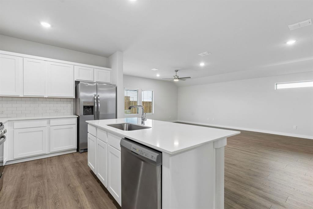 Kitchen in the Oscar home plan by Trophy Signature Homes – REPRESENTATIVE PHOTO Kitchen in the Oscar home plan by Trophy Signature Homes – REPRESENTATIVE PHOTO