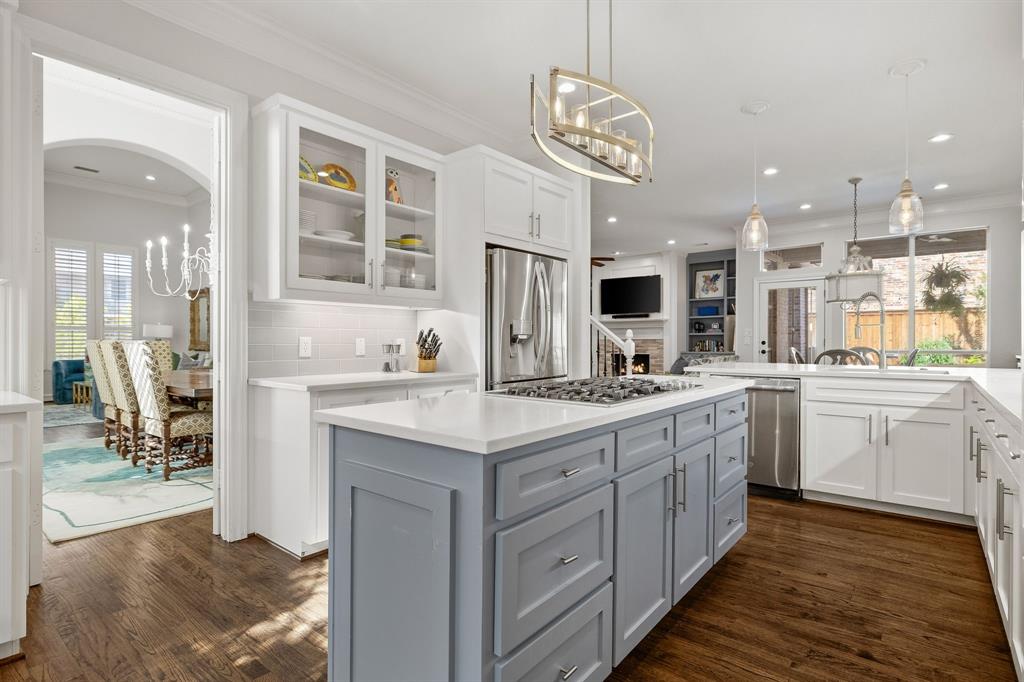 Kitchen flows into the formal dining room making entertaining a breeze.