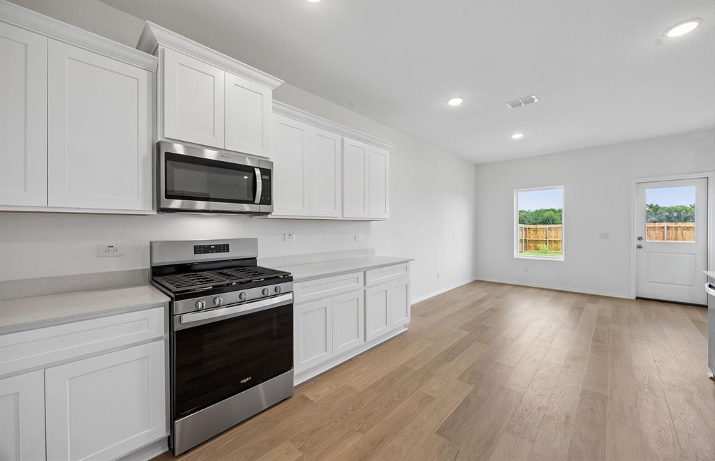 *Floorplan representation, not actual home - Dining area off kitchen with large windows