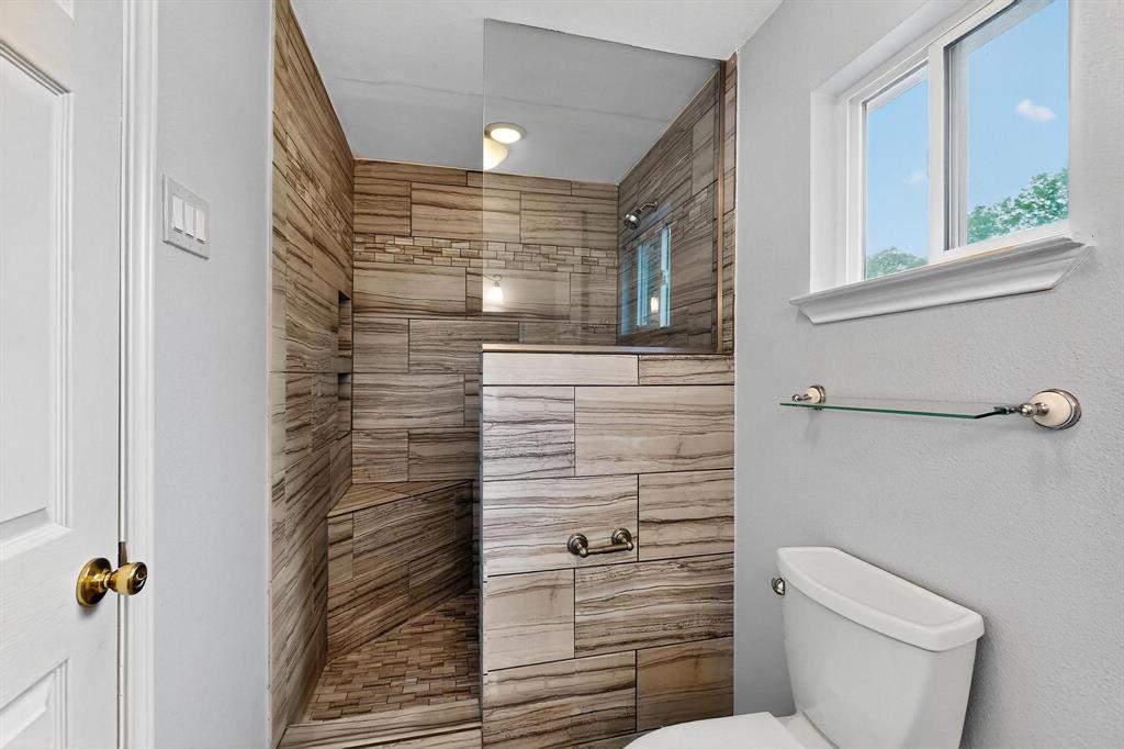 Full bath featuring walk in shower