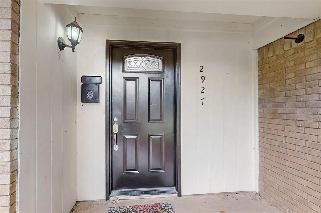 View of exterior entry featuring brick siding View of exterior entry featuring brick siding