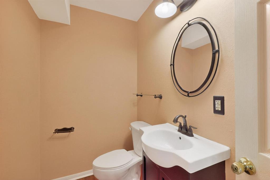 Bathroom featuring toilet and vanity